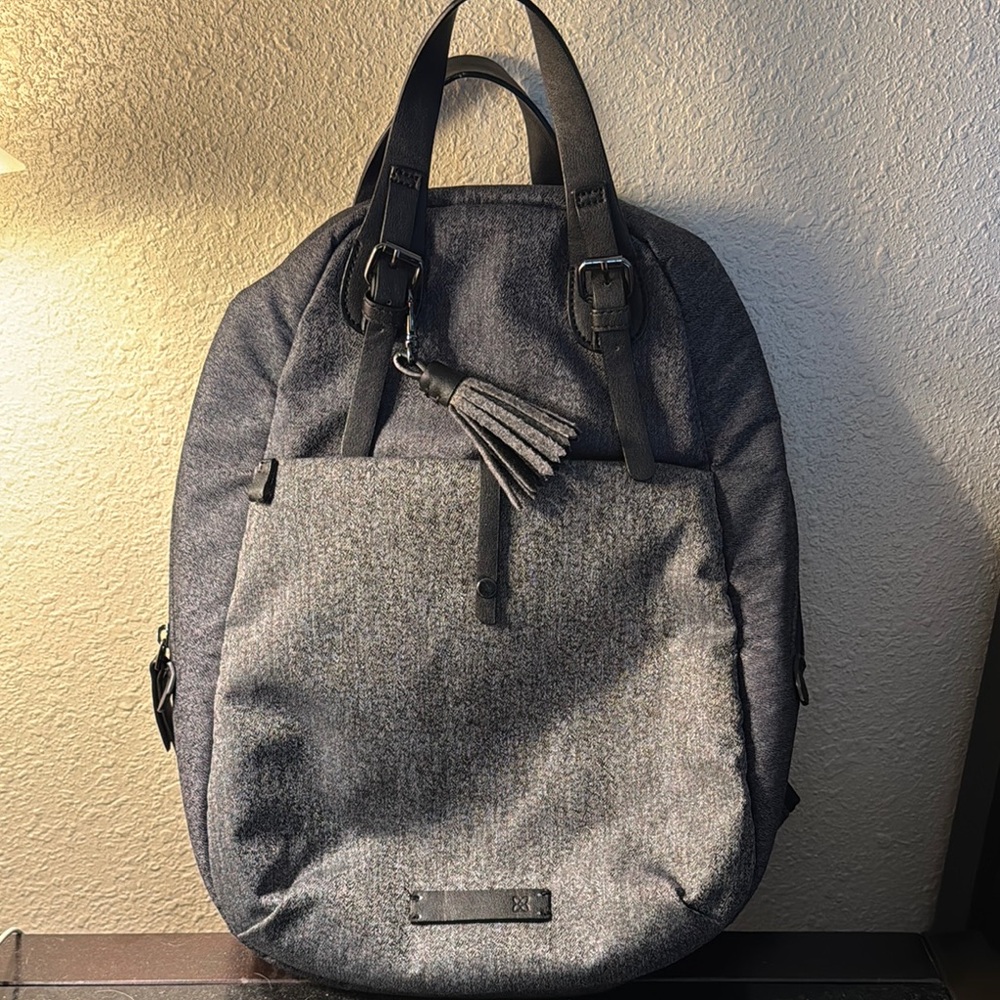 Sherpani spire Gray Backpack with Tassel Accent